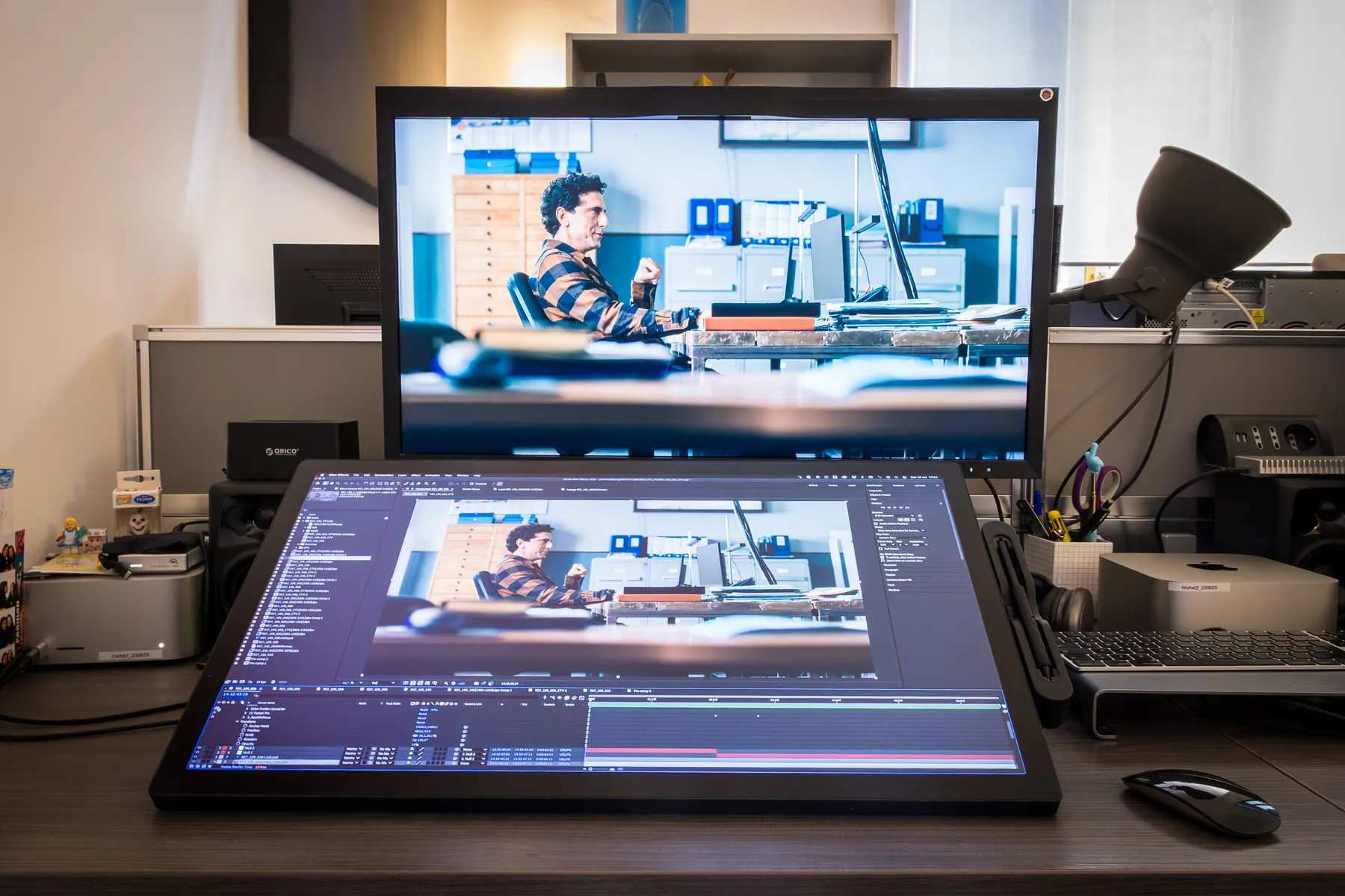Sala di lavorazione con monitor e tavoletta grafica